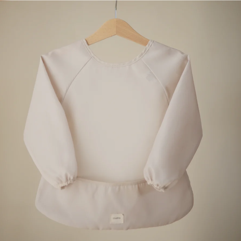 mushie Long Sleeve Baby Bib | Mess Free & Waterproof Fabric for Toddlers | Adjustable Fit for Ages 6-24 Months (Fog)